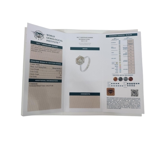 43 - AN 18CT WHITE GOLD AND 5.15CT ROUND BRILLIANT CUT DIAMOND RING
Six claw setting, complete with WGI c... 