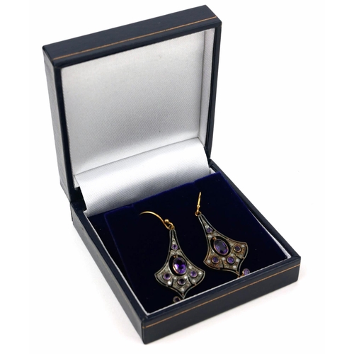 28 - A PAIR OF VINTAGE STYLE FLARED DROP EARRINGS SET WITH AMETHYSTS AND DIAMONDS.  
(Amethysts approx 1.... 