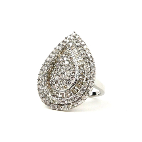 50 - A LARGE 9CT WHITE GOLD,  DIAMOND COCKTAIL PEAR SHAPED STATEMENT RING set with baguette and round bri... 