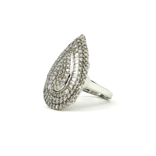 50 - A LARGE 9CT WHITE GOLD,  DIAMOND COCKTAIL PEAR SHAPED STATEMENT RING set with baguette and round bri... 