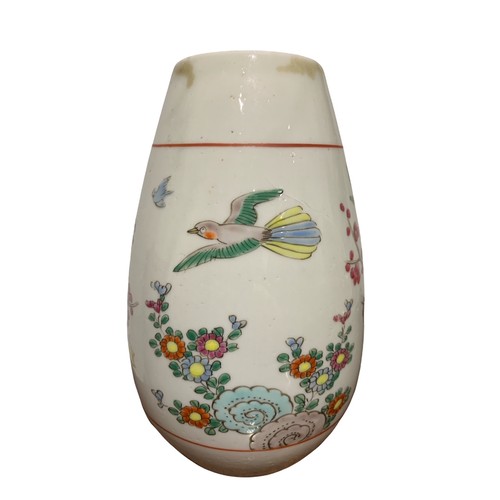 97 - A JAPANESE TAISHO PERIOD VASE DECORATED with flowers and birds on a white ground.
H-16.8cm