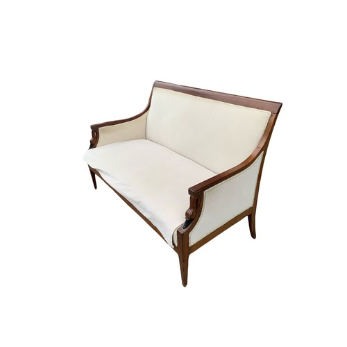 90 - A LATE 19TH/EARLY 20TH CENTURY FRENCH EMPIRE DESIGN MAHOGANY AND UPHOLSTERED SETTEE
The arms carved ... 