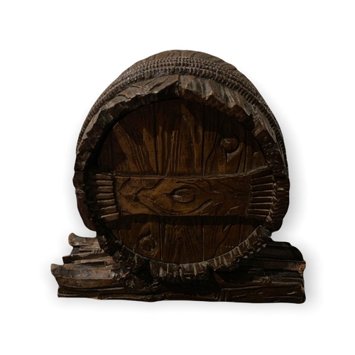 113 - A RARE 19TH CENTURY GUÉRET FRÈRES, PARIS, CARVED LIMEWOOD LIQUOR BOX FORMED AS A BARREL, GUARDED BY ... 