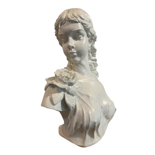 119 - A DECORATIVE PAINTED BUST, A YOUNG LADY WEARING A ROSE.
(h 54cm x d 24cm x w 44cm)