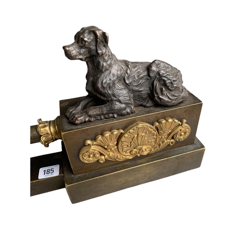 125 - AN EARLY 19TH CENTURY FRENCH BRONZE AND ORMOLU MOUNTED FIRE CHENET 
With two recalling Spaniel dogs.... 