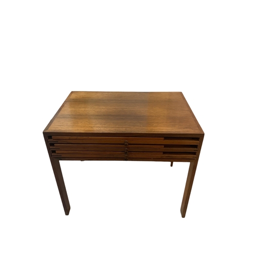 124 - ILLUM WIKKELSØ FOR CFC SILKEBORG, A MID 20TH CENTURY DANISH ROSEWOOD NEST OF FOUR TABLES
Containing ... 