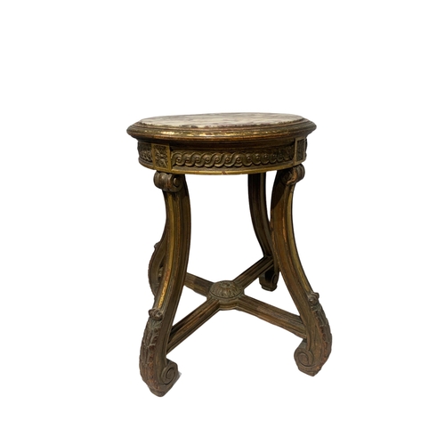 148 - A 19TH CENTURY FRENCH CARVED AND PAINTED WALNUT AND PARCEL GILT MARBLE TOP JARDINIÈRE STAND
Raised o... 