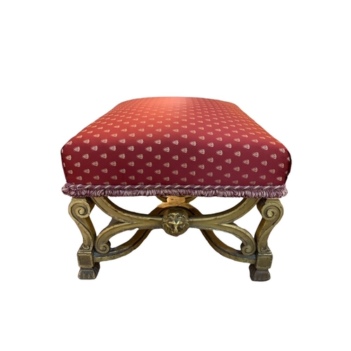 166 - A 19TH CENTURY CHARLES X DESIGN CARVED GILTWOOD X FRAME STOOL
The upholstered seat raised on four sc... 