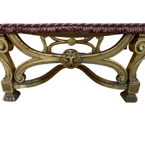 166 - A 19TH CENTURY CHARLES X DESIGN CARVED GILTWOOD X FRAME STOOL
The upholstered seat raised on four sc... 