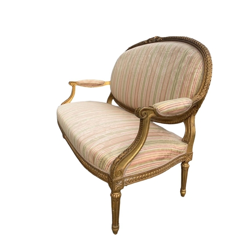 174 - AN 18TH/19TH CENTURY LOUIS XV DESIGN GILTWOOD SETTEE
The carved padded back above scrolling arms and... 