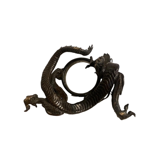 79 - AFTER TOUN CHU, A MEJI PERIOD, 1868 - 1912, JAPANESE BRONZE KORO
Having rounded sides rising from a ... 