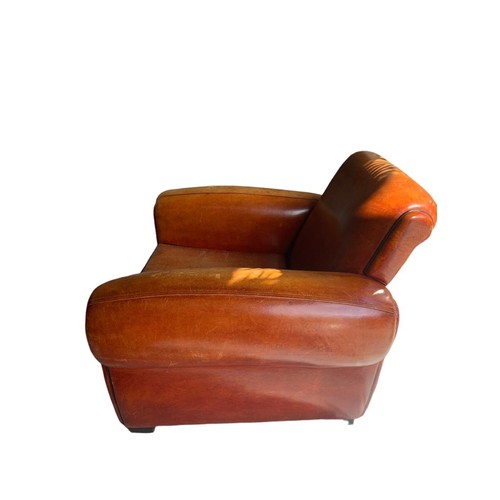 128 - A PAIR OF LARGE TAN LEATHER GENTLEMAN CLUB ARMCHAIRS
Raised on block feet.
(H 80cm x d 97cm x w 98cm... 