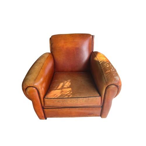 128 - A PAIR OF LARGE TAN LEATHER GENTLEMAN CLUB ARMCHAIRS
Raised on block feet.
(H 80cm x d 97cm x w 98cm... 