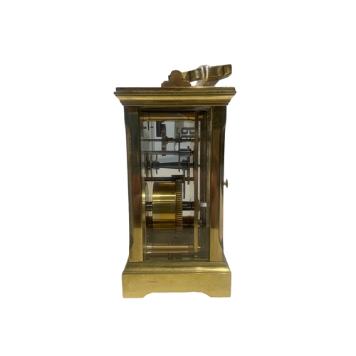 66 - MAPPIN & WEBB, A BRASS CARRIAGE CLOCK. 
(h 14.6cm)