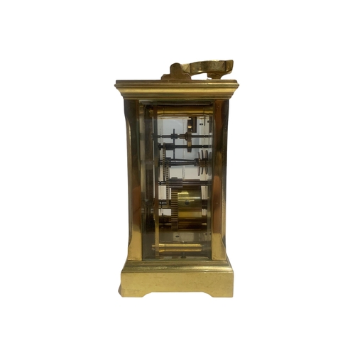 66 - MAPPIN & WEBB, A BRASS CARRIAGE CLOCK. 
(h 14.6cm)