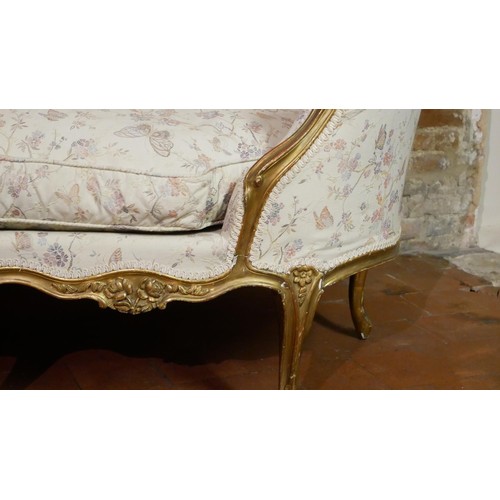 132 - MANNER OF ETIENNE MEUNIER, AN 18TH CENTURY LOUIS XV CARVED GILTWOOD CANAPÉ EN CORBEILLE SETTEE 
The ... 