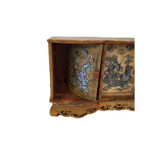 202 - A LATE 19TH/EARLY 20TH CENTURY CHINESE ORIENTAL MARBLE MINIATURE CABINET 
Having four cupboard doors... 