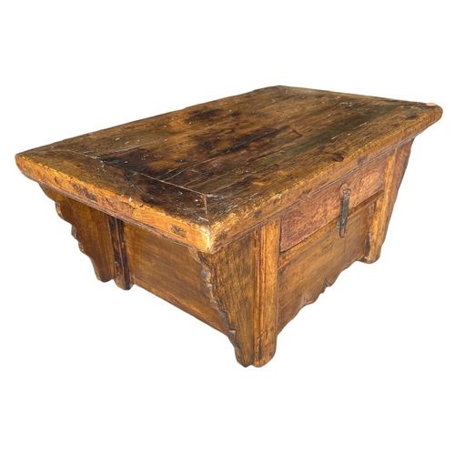 242 - A CHINESE ELM LOW TABLE
Having a single central drawer.
(h 32cm x w 74cm x d 44.5cm)