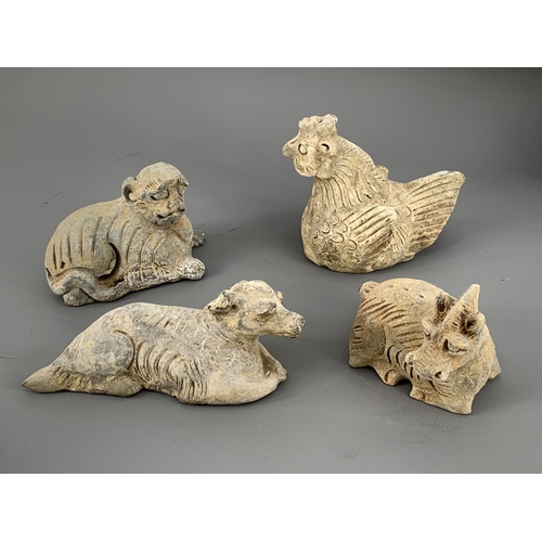 279 - A RARE GROUP OF TWELVE POTTERY ZODIAC ANIMALS, YUAN DYNASTY, AD. 1279 – 1368
Each grey pottery figur... 