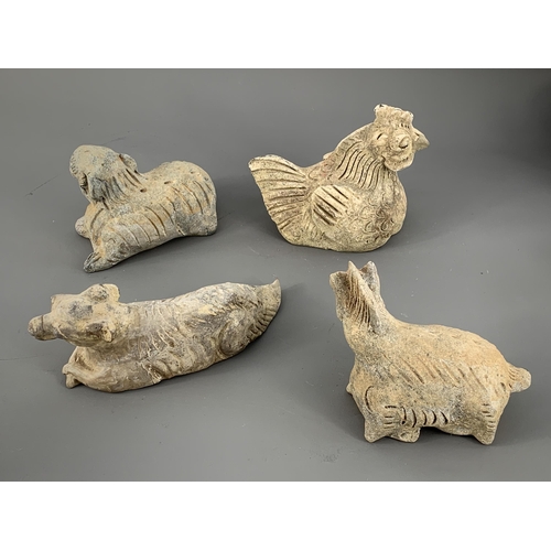 279 - A RARE GROUP OF TWELVE POTTERY ZODIAC ANIMALS, YUAN DYNASTY, AD. 1279 – 1368
Each grey pottery figur... 