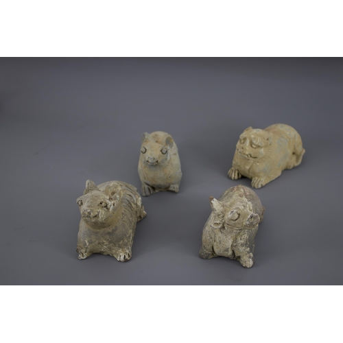 279 - A RARE GROUP OF TWELVE POTTERY ZODIAC ANIMALS, YUAN DYNASTY, AD. 1279 – 1368
Each grey pottery figur... 