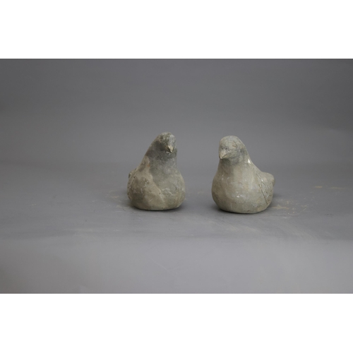 281 - AN UNUSUAL PAIR OF POTTERY DOVES, HAN DYNASTY, BC 206 - AD 220
The grey ware hand modelled, and with... 