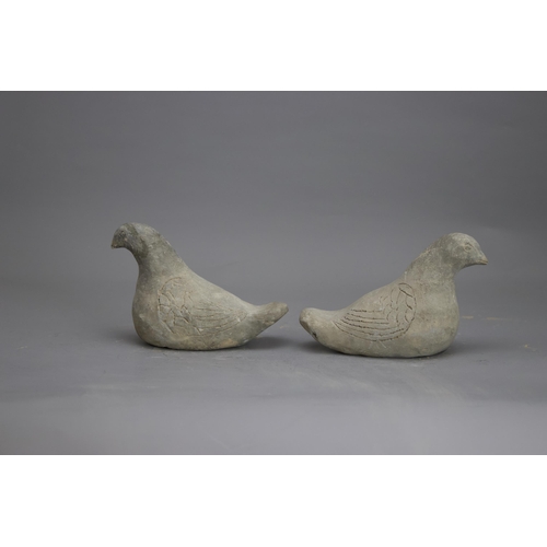 281 - AN UNUSUAL PAIR OF POTTERY DOVES, HAN DYNASTY, BC 206 - AD 220
The grey ware hand modelled, and with... 