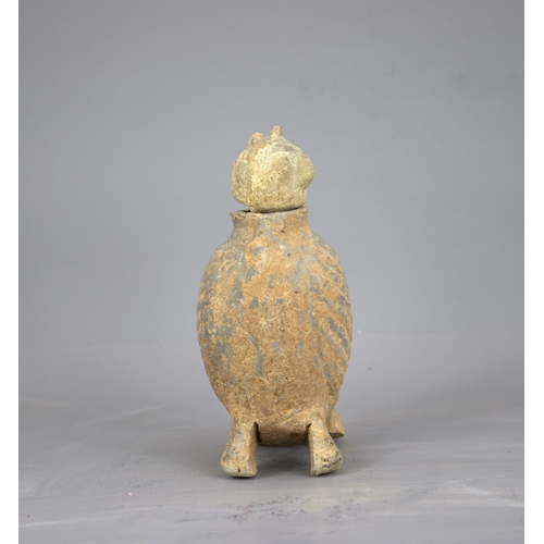 287 - A RARE POTTERY OWL, WITH SEPARATELY MOULDED HEAD, HAN DYNASTY (BC 206 - AD 220)
The grey pottery bod... 