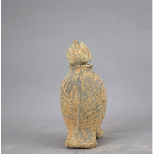 287 - A RARE POTTERY OWL, WITH SEPARATELY MOULDED HEAD, HAN DYNASTY (BC 206 - AD 220)
The grey pottery bod... 