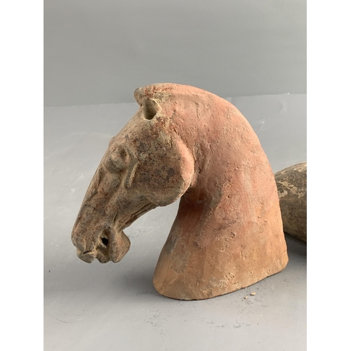 289 - A POTTERY HORSE'S HEAD AND A DUCK, HAN DYNASTY (BC 206 - AD 220)
The grey pottery applied with a red... 