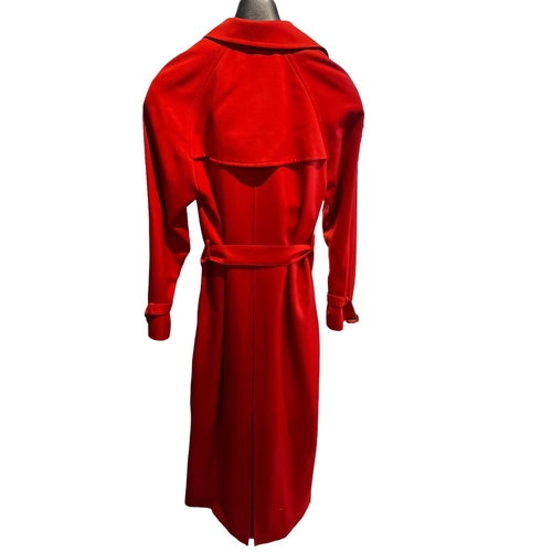 106A - DAKS, A SIGNATURE LONG RED MAXI BELTED COAT.
(size 36)