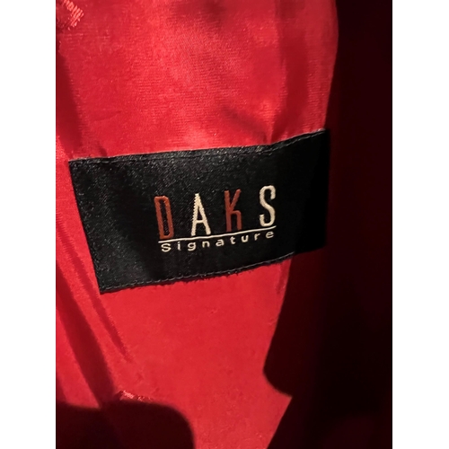 106A - DAKS, A SIGNATURE LONG RED MAXI BELTED COAT.
(size 36)