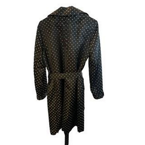 108A - JAEGER, A BLACK AND WHITE POLKA DOT BELTED JACKET.
(size M)