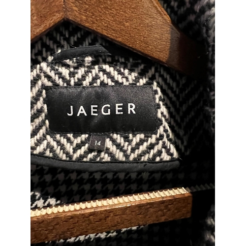 119A - JAEGER, A BLACK AND WHITE HERRINGBONE COAT.
(size 14)