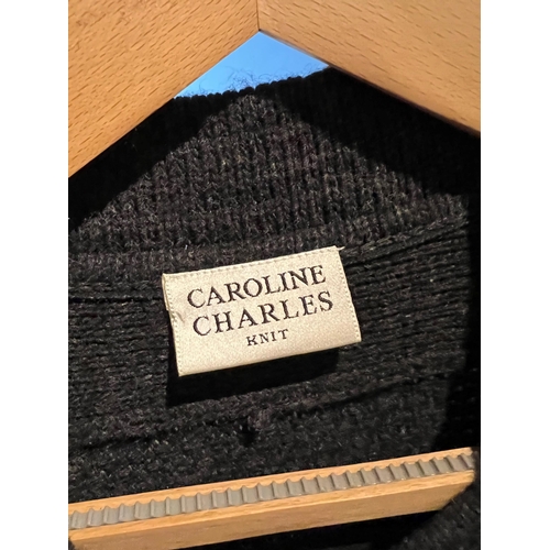 120A - CAROLINE CHARLES, A KNITTED NAVY CARDIGAN.
(size M)