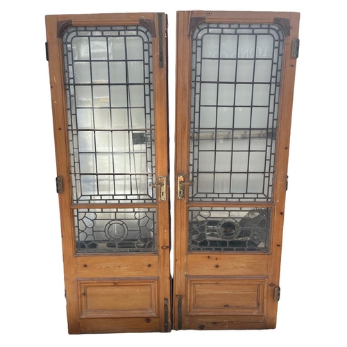 238 - A COLLECTION OF VICTORIAN LEADED AND STAINED GLASS PINE DOORS AND PANELS.
(large pair of doors h 204... 