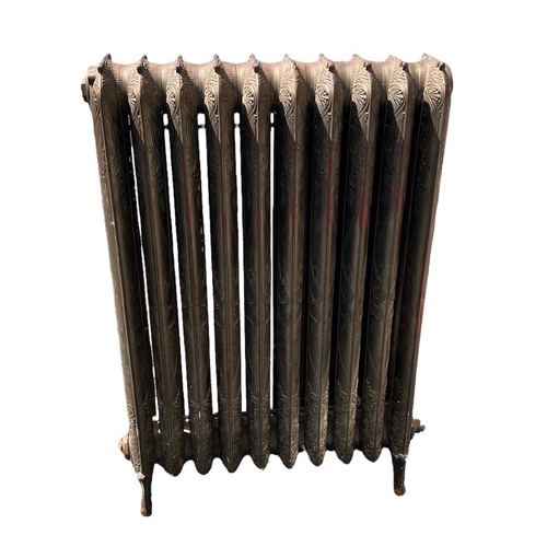 246 - A LARGE FLOORSTANDING TEN BAR ART NOUVEAU CAST IRON RADIATOR 
Decorated with stylised scrolling leav... 