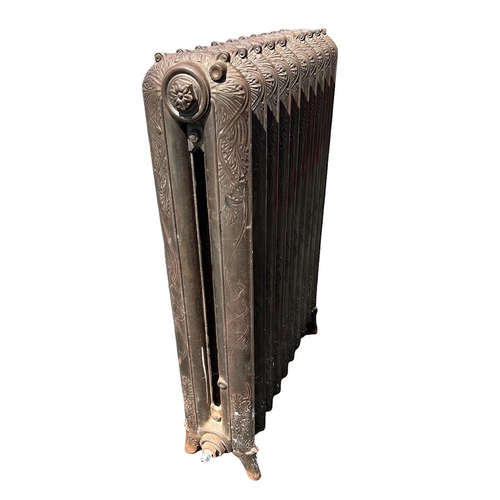 246 - A LARGE FLOORSTANDING TEN BAR ART NOUVEAU CAST IRON RADIATOR 
Decorated with stylised scrolling leav... 