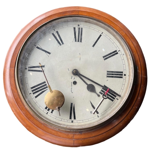 263 - A LARGE 19TH CENTURY MAHOGANY AND BRASS CIRCULAR WALL CLOCK
With painted dial and Roman numerals, co... 