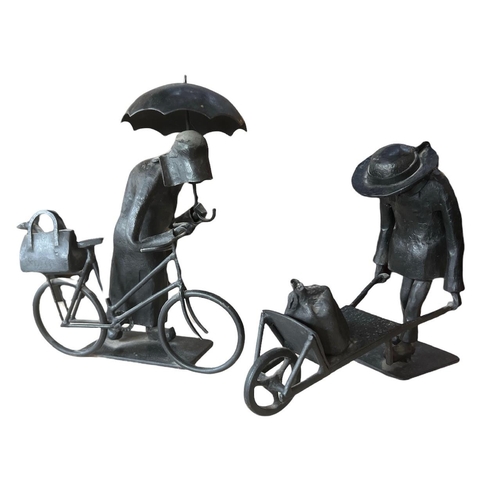 269 - PAUL HENRI HERRY, 1928 - 2018, FRENCH, A PAIR OF STYLISH WROUGHT IRON SCULPTURES 
Woman pushing her ... 