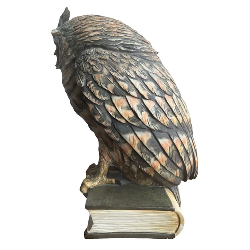 270 - GUIDO CACCIAPUOTI, ITALIAN, 1892 - 1953, A LARGE PORCELAIN OWL PERCHED ON A BOOK
Signed on spine.
(h... 