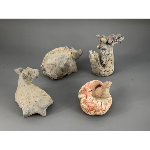 279 - A RARE GROUP OF TWELVE POTTERY ZODIAC ANIMALS, YUAN DYNASTY, AD. 1279 – 1368
Each grey pottery figur... 