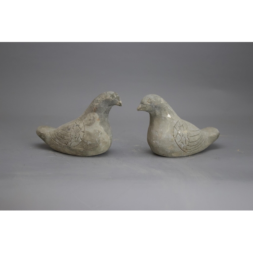 281 - AN UNUSUAL PAIR OF POTTERY DOVES, HAN DYNASTY, BC 206 - AD 220
The grey ware hand modelled, and with... 