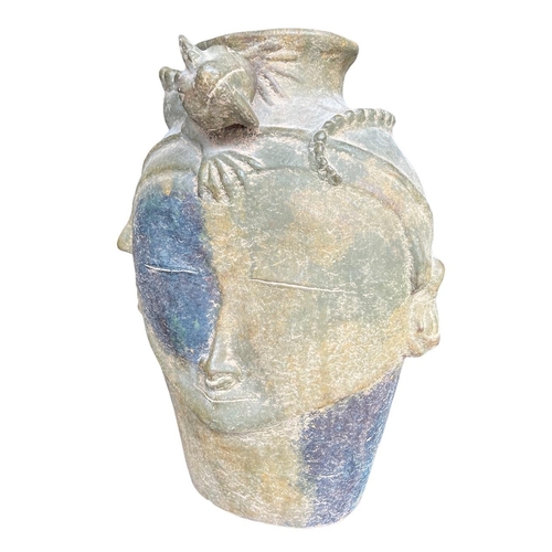 282 - A LARGE DECORATIVE ASIAN POTTERY FACIAL MASK VASE WITH LIZARD HEADDRESS.
(H 46cm x W 35cm x D 23cm)