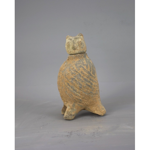 287 - A RARE POTTERY OWL, WITH SEPARATELY MOULDED HEAD, HAN DYNASTY (BC 206 - AD 220)
The grey pottery bod... 