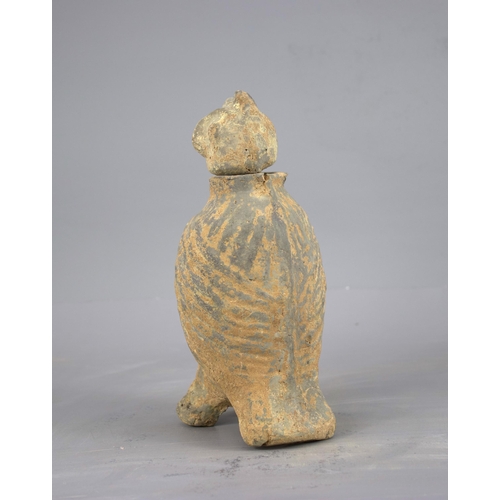 287 - A RARE POTTERY OWL, WITH SEPARATELY MOULDED HEAD, HAN DYNASTY (BC 206 - AD 220)
The grey pottery bod... 