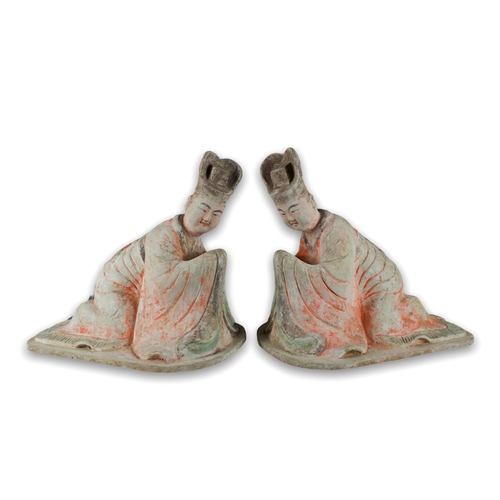 297 - A large pair of pottery Figures of kneeling Courtiers, Tang dynasty, AD 618 - 907

L: 38cm

PROPERTY... 