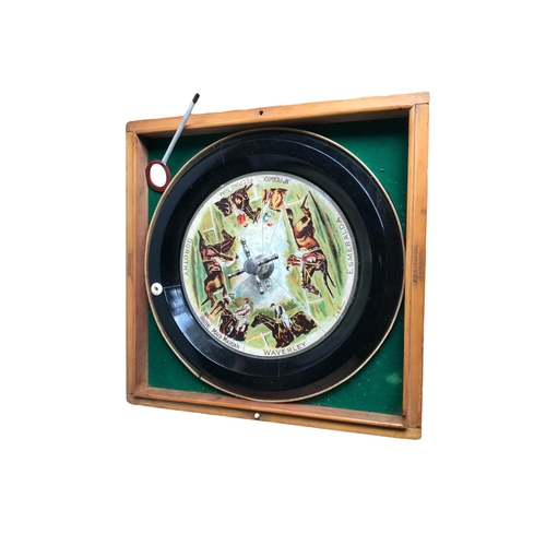 243 - A COMPLETE 1920’S ‘SANDOWN’ ROULETTE GAME BY F.H. AYRES LTD
Housed in a pine wood case. 
(Height 11.... 