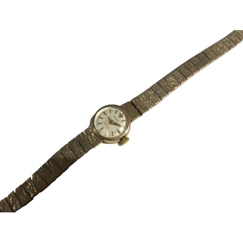 19 - ROLEX, PRECISION, A 9CT GOLD LADIES’ WRISTWATCH
Having a textured design link strap and embossed Rol... 