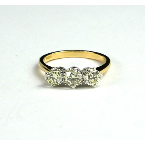 16 - AN 18CT WHITE AND YELLOW GOLD DIAMOND TRILOGY RING
with WGI certificate.
(diamonds 1.26ct)